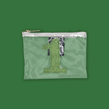 clear vinyl zipper pouch for stadiums with the number 1 appliqued in green on a green background