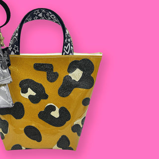 OVERSIZED CLUTCHES, HANDLE BAGS & BACKPACKS!