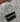 Customizable crossbody bag that features a bobby pin applique in gold and white sparkly canvas on a black glitter infused vinyl. Crossbody strap is a clear acrylic chain. 