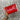 Customizable crossbody bag that features "Pamtastic" name applique in pink sparkly canvas on a red glitter infused vinyl. Crossbody strap is a clear acrylic chain. 