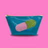 Blue glitter infused pouch with a green and pink glittery pill applique on the front. 
