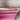 Close up of double zipper featured on the small biz bag. Zipper is custom to Julie Mollo! and is a cute xoxo design.